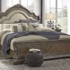 Ashley Charmond California King Upholstered Bed - Brown