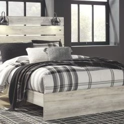Ashley Cambek Queen Panel Bed Beds